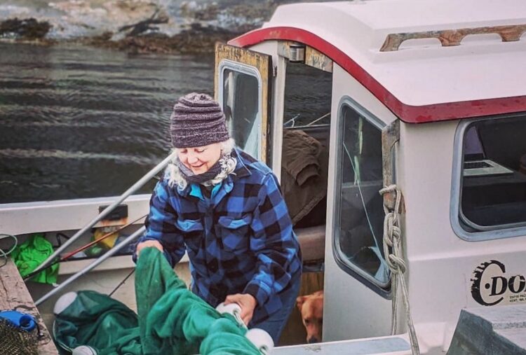 Photo of Alexandra Morton in fishing boat
