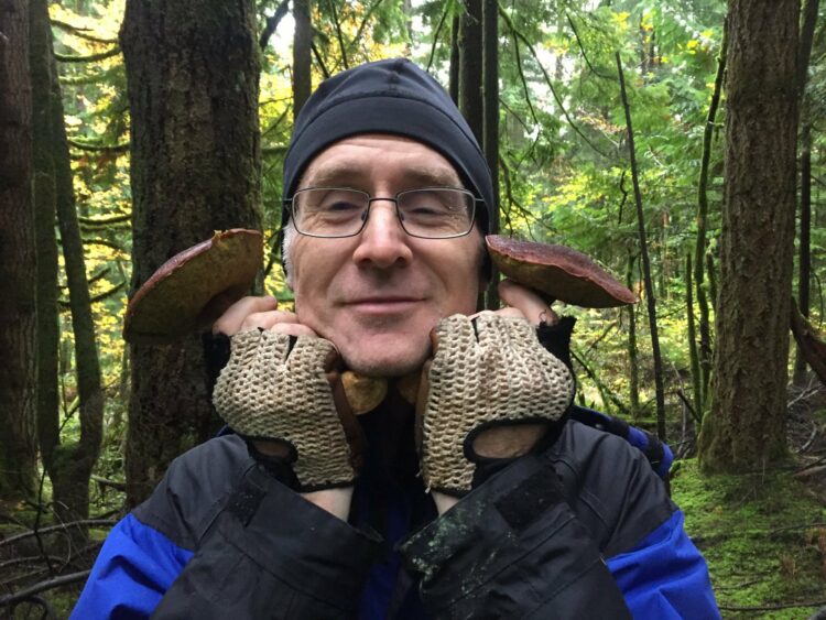 reducing food waste: photo of mushroom hunters in a Maple Ridge forest