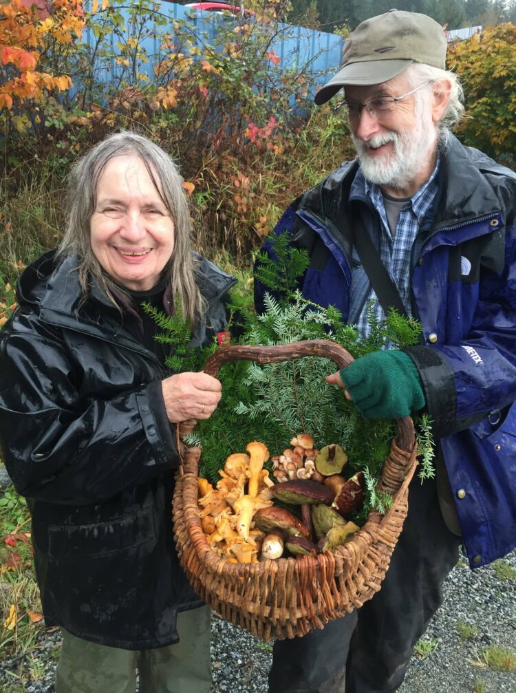 reducing food waste: photo of mushroom hunters in a Maple Ridge forest